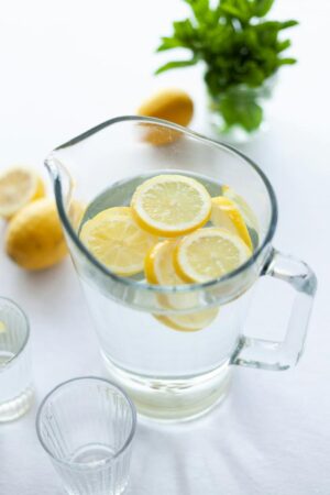 glass of lemon water full of minerals