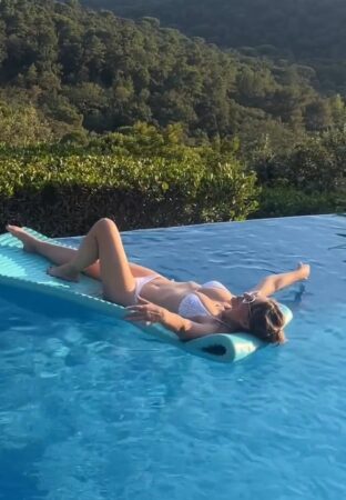 a valley view from the pool with Elizabeth Hurley in a bikini