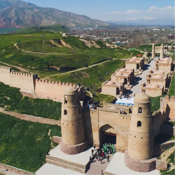 Hisor Fortress in Tajikistan with its iconic arched gate on the 5 Stans Tour.