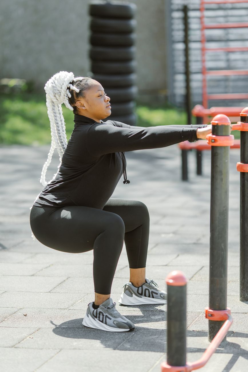 a woman working out outdoors