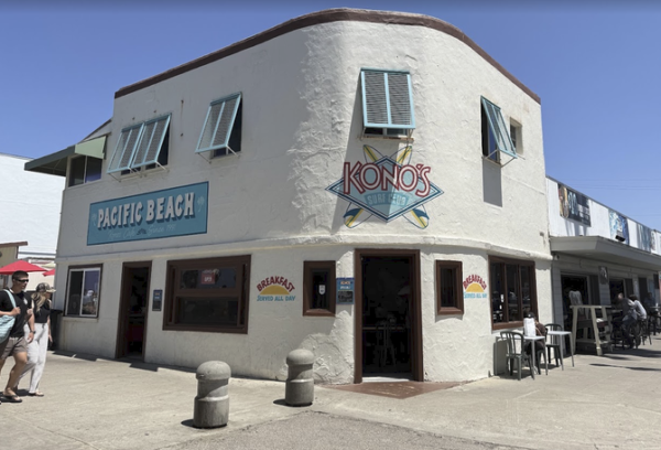 If you’ve spent any time in PB, you know Kono’s. It’s that weathered, wooden boardwalk institution where the line wraps around the corner by 7:00 AM, the bacon smoke smells like heaven, and nobody gives a damn what kind of car you drive.